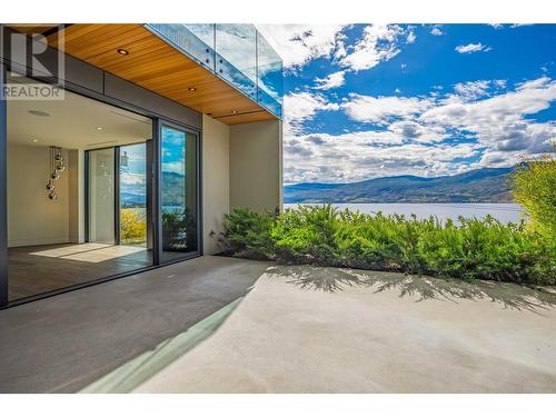 Lower level private patio - 3985 Beachview Drive, West Kelowna, BC - Outdoor With Body Of Water With View