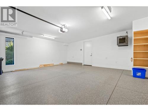 Heated garage w/2 EV outlets and cold/hot taps - 3985 Beachview Drive, West Kelowna, BC - Indoor