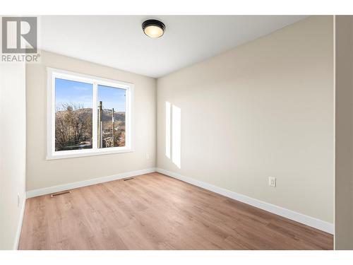 One of Three Bedrooms Upstairs - 3907 26 Street Unit# 1, Vernon, BC - Indoor Photo Showing Other Room