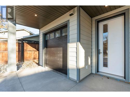 Front Door and Tandem Garage - 3907 26 Street Unit# 1, Vernon, BC - Outdoor With Deck Patio Veranda With Exterior