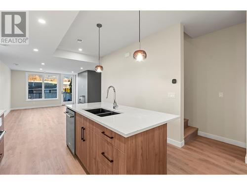 Stylish Lighting - 3907 26 Street Unit# 1, Vernon, BC - Indoor Photo Showing Kitchen With Double Sink