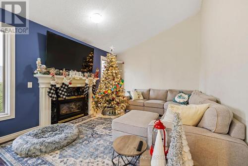 76 Redfern Avenue, Hamilton, ON - Indoor Photo Showing Living Room With Fireplace