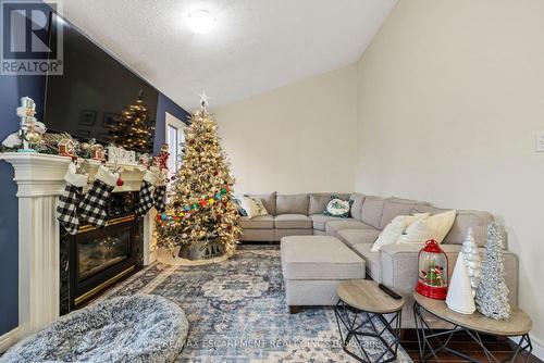 76 Redfern Avenue, Hamilton, ON - Indoor Photo Showing Living Room With Fireplace