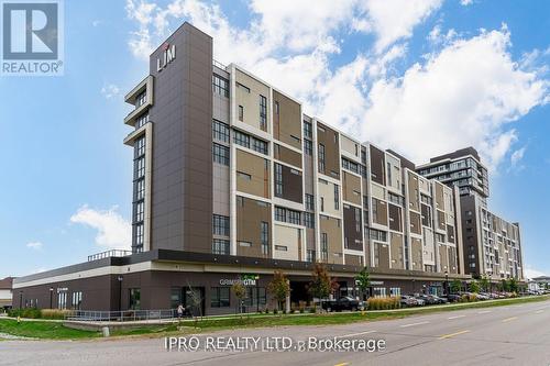 309 - 560 North Service Road, Grimsby, ON - Outdoor With Facade