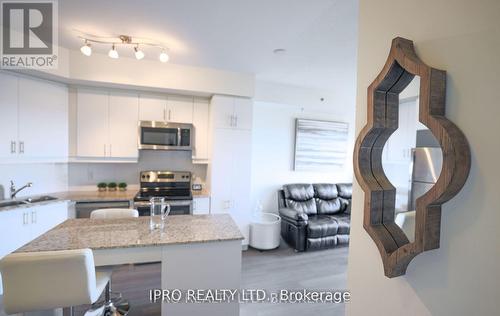 309 - 560 North Service Road, Grimsby, ON - Indoor Photo Showing Kitchen With Double Sink