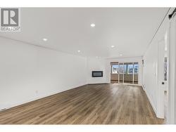 Gorgeous stretched ceilings throughout give the unit a modern and sleek feel - 