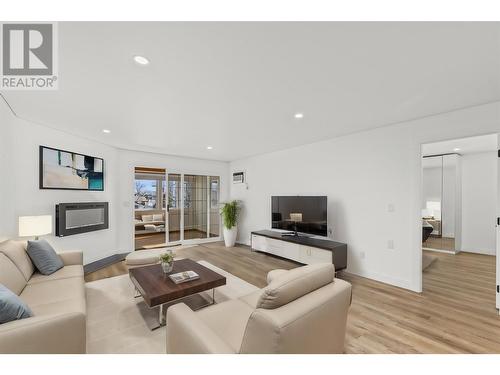 virtually staged living room - 3000 Richter Street Unit# 21, Kelowna, BC - Indoor Photo Showing Living Room