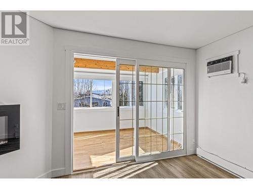 Deck was enclosed as a sunroom... - 3000 Richter Street Unit# 21, Kelowna, BC - Indoor Photo Showing Other Room