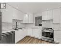 3000 Richter Street Unit# 21, Kelowna, BC  - Indoor Photo Showing Kitchen With Double Sink With Upgraded Kitchen 