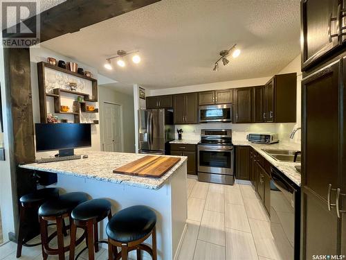 1230 Arnason Street N, Regina, SK - Indoor Photo Showing Kitchen With Double Sink With Upgraded Kitchen