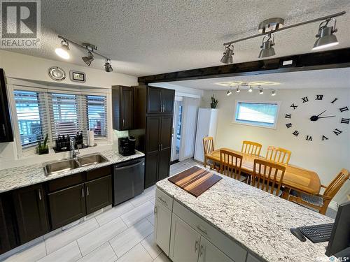 1230 Arnason Street N, Regina, SK - Indoor Photo Showing Kitchen With Double Sink