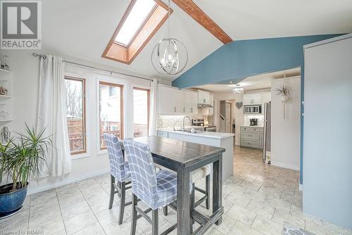 Breakfast nook with vaulted ceiling with skylights, view of the kitchen - 11 Golden Place, Ingersoll, ON - Indoor Photo Showing Dining Room