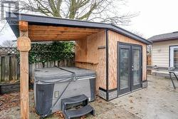 View of shed and hot tub - 