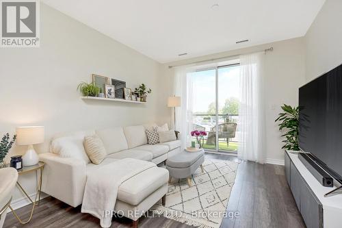 310 - 383 Main Street E, Milton, ON - Indoor Photo Showing Living Room