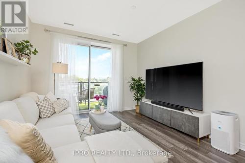 310 - 383 Main Street E, Milton, ON - Indoor Photo Showing Living Room