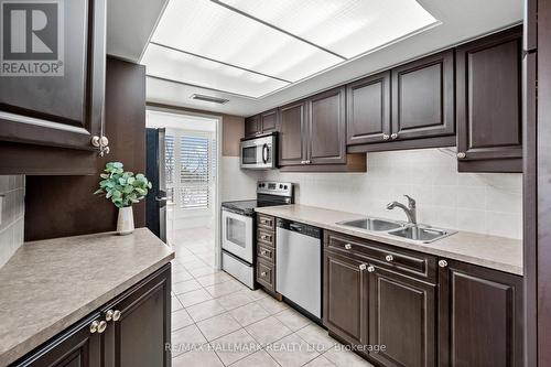 407 - 1111 Bough Beeches Boulevard, Mississauga, ON - Indoor Photo Showing Kitchen With Double Sink