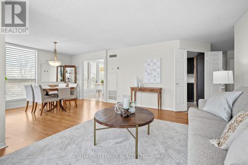 407 - 1111 Bough Beeches Boulevard, Mississauga, ON - Indoor Photo Showing Living Room