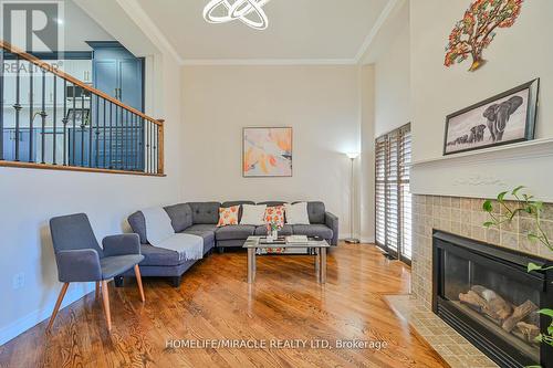 66 - 7385 Magistrate Terrace, Mississauga, ON - Indoor Photo Showing Living Room With Fireplace