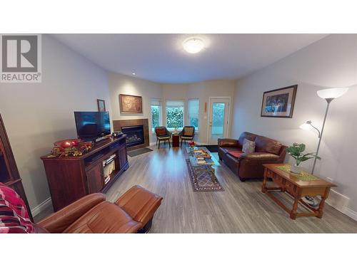 54 490 Lewis Drive, Quesnel, BC - Indoor Photo Showing Living Room With Fireplace