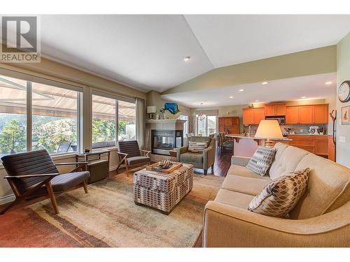 580 Denali Drive, Kelowna, BC - Indoor Photo Showing Living Room With Fireplace