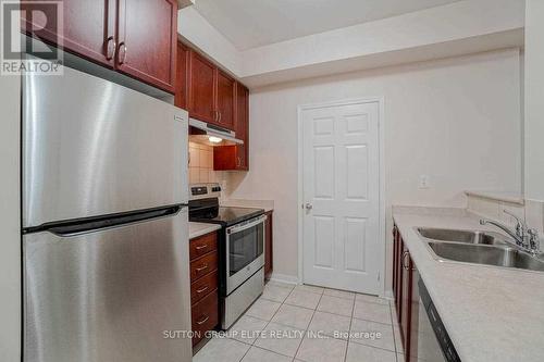 101 - 5705 Long Valley Road, Mississauga, ON - Indoor Photo Showing Kitchen With Double Sink