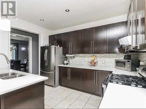 23 Alice Springs Crescent, Brampton, ON - Indoor Photo Showing Kitchen With Double Sink