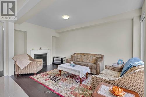 58 Mary Watson Street, North Dumfries, ON - Indoor Photo Showing Living Room With Fireplace