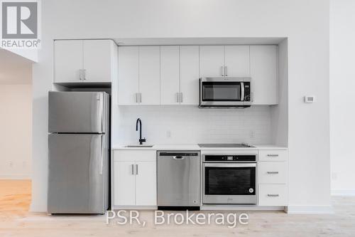 Th105 - 2799 Kingston Road, Toronto, ON - Indoor Photo Showing Kitchen