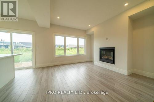 44 Campbell Crescent, Prince Edward County, ON - Indoor Photo Showing Living Room With Fireplace