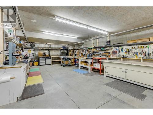 Woodshop on site - 1950 Durnin Road Unit# 408, Kelowna, BC - Indoor Photo Showing Garage