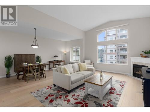 Welcome to #408 1950 Durnin Road! - 1950 Durnin Road Unit# 408, Kelowna, BC - Indoor Photo Showing Living Room With Fireplace