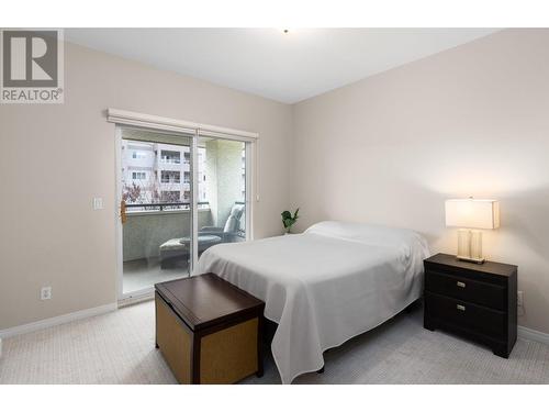 Bedroom - 1950 Durnin Road Unit# 408, Kelowna, BC - Indoor Photo Showing Bedroom