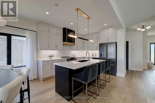 133 Basil Crescent, Middlesex Centre, ON - Indoor Photo Showing Kitchen With Upgraded Kitchen