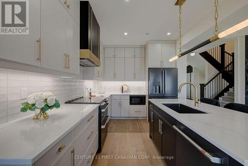 133 Basil Crescent, Middlesex Centre, ON - Indoor Photo Showing Kitchen With Upgraded Kitchen