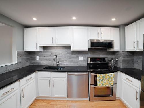 305-1252 Pandora Ave, Victoria, BC - Indoor Photo Showing Kitchen With Double Sink With Upgraded Kitchen