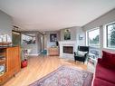 305-1252 Pandora Ave, Victoria, BC  - Indoor Photo Showing Living Room With Fireplace 