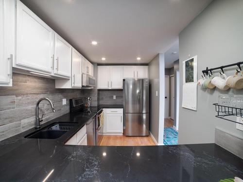 305-1252 Pandora Ave, Victoria, BC - Indoor Photo Showing Kitchen With Double Sink With Upgraded Kitchen