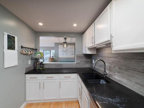 305-1252 Pandora Ave, Victoria, BC - Indoor Photo Showing Kitchen With Double Sink