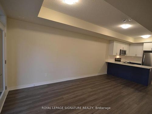 107-1573 Rose Way, Milton, ON - Indoor Photo Showing Kitchen