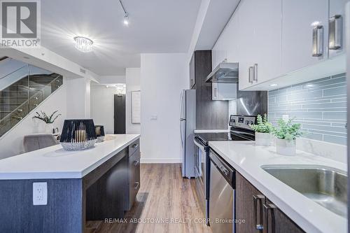 C202 - 5260 Dundas Street, Burlington, ON - Indoor Photo Showing Kitchen With Upgraded Kitchen