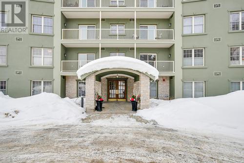 309 - 24 Ontario Street, Bracebridge, ON - Outdoor With Balcony With Facade