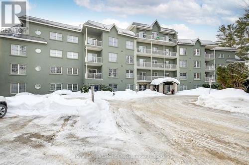 309 - 24 Ontario Street, Bracebridge, ON - Outdoor With Balcony With Facade