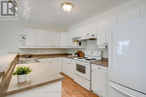 309 - 24 Ontario Street, Bracebridge, ON - Indoor Photo Showing Kitchen With Double Sink