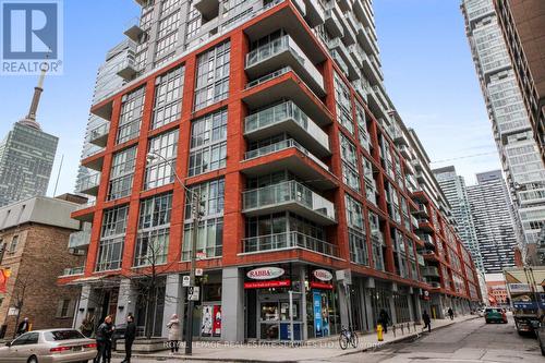 710 - 126 Simcoe Street, Toronto, ON - Outdoor With Balcony With Facade