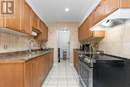 410 - 45 Silverstone Drive, Toronto, ON - Indoor Photo Showing Kitchen With Double Sink