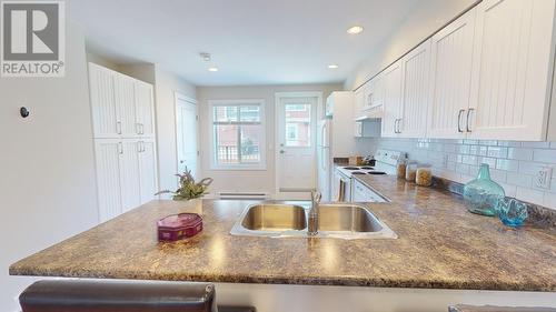 119 10303 112 Street, Fort St. John, BC - Indoor Photo Showing Kitchen With Double Sink With Upgraded Kitchen