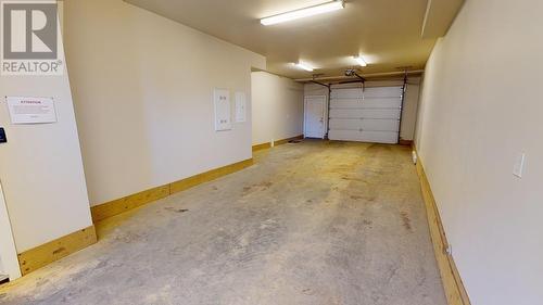 119 10303 112 Street, Fort St. John, BC - Indoor Photo Showing Garage