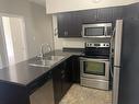 403-5170 Dallas Drive, Kamloops, BC  - Indoor Photo Showing Kitchen With Double Sink 