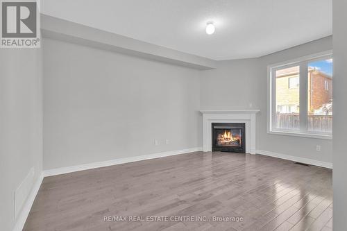 466 Cedric Terrace, Milton, ON - Indoor Photo Showing Other Room With Fireplace