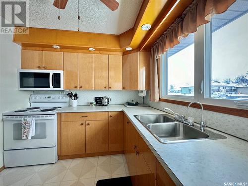 18 Waterloo Road, Yorkton, SK - Indoor Photo Showing Kitchen With Double Sink